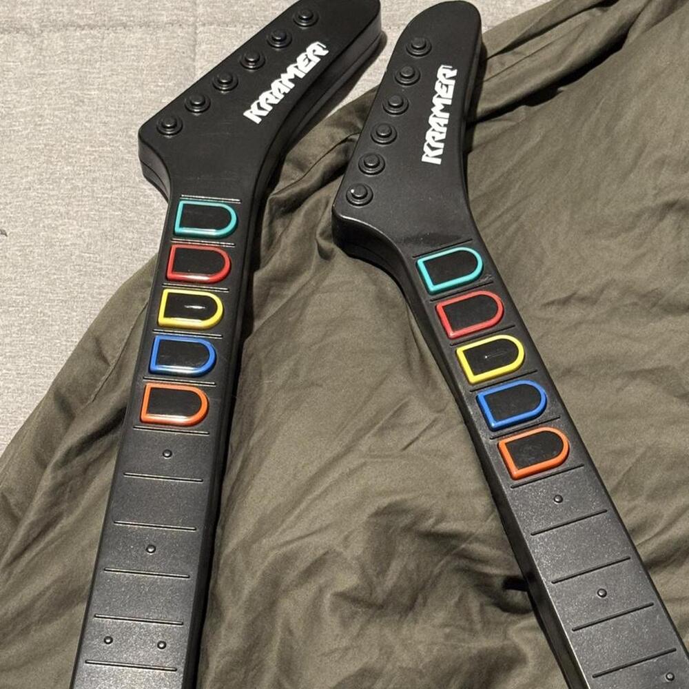 Guitar Hero 5 guitar controllers with colorful lettering on the neck - Picture 2 of 4